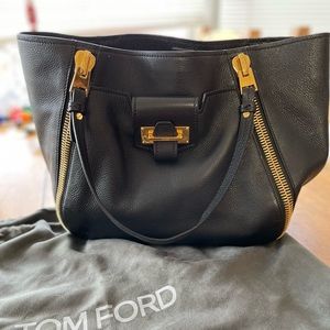 Tom Ford Black leather shoulder bag with gold hardware.
